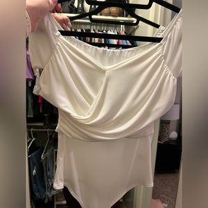 New tags white body suit
